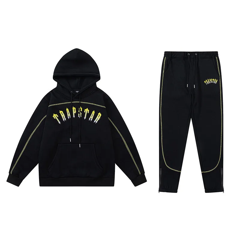 trapstar-yellow-logo-black-tracksuit trapstar-yellow-logo-black-tracksuit